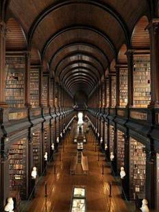 picture of a long corridor of levels of books in a library