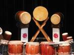 many japanese taiko drums on display