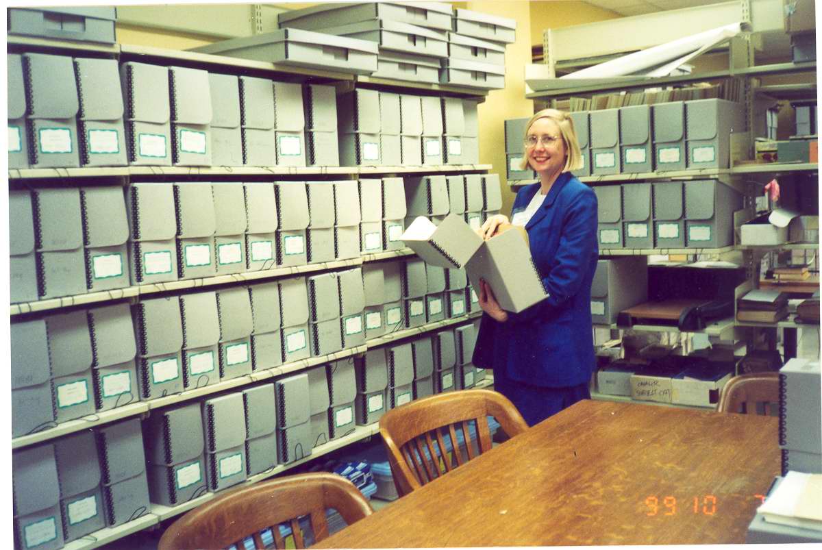 Rebecca Ebert, Archives Librarian, in the storage room of the Stewart Bell Jr. Archives