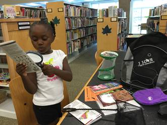 Girl Inspecting Backpack