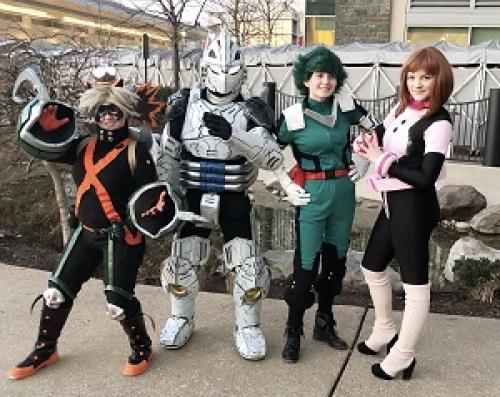 A group of cosplayers dressed as characters from My Hero Academia.