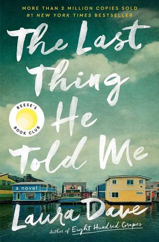 blue-gray book with title "the last thing he told me"