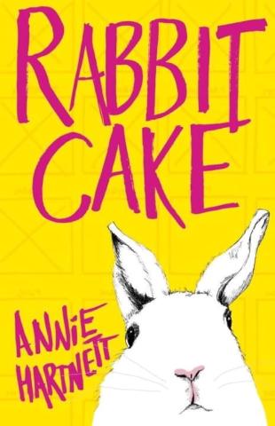 yellow book with white rabbit on cover and the title "Rabbit Cake"