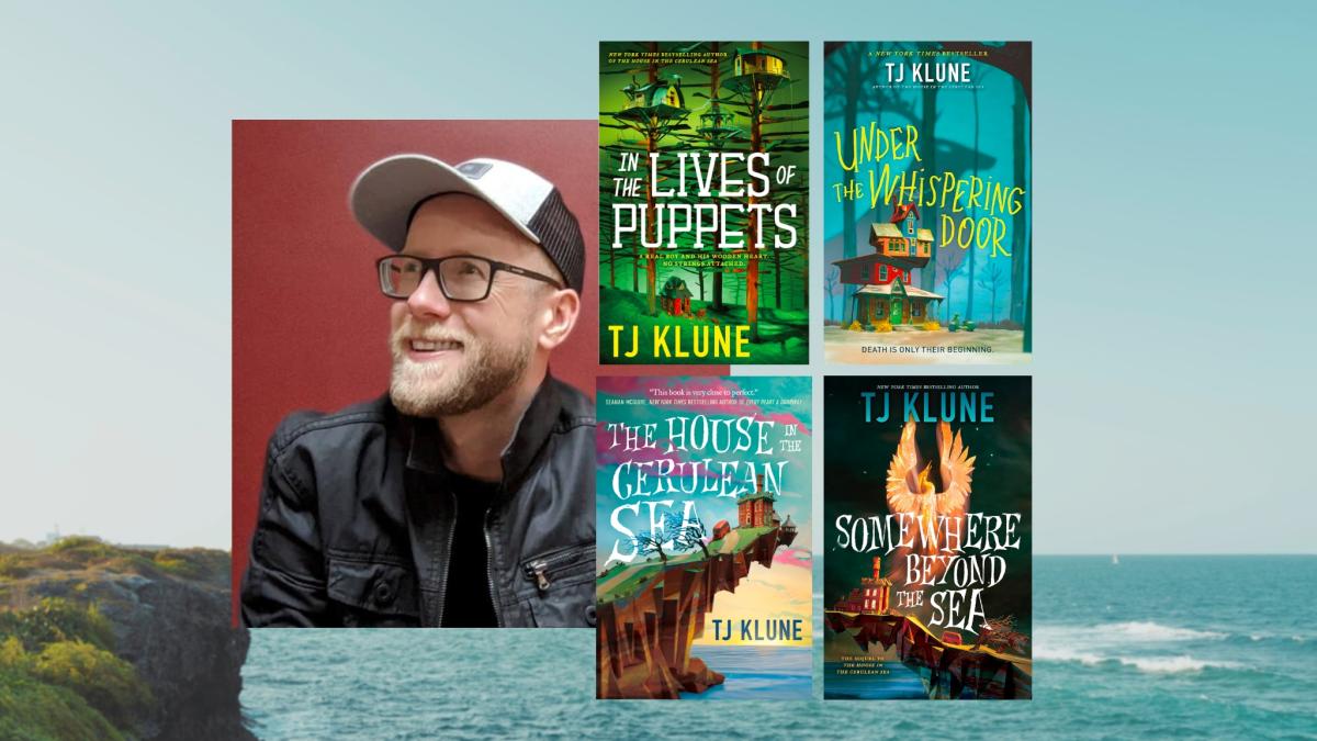 author tj klune pictured with 4 of his novels