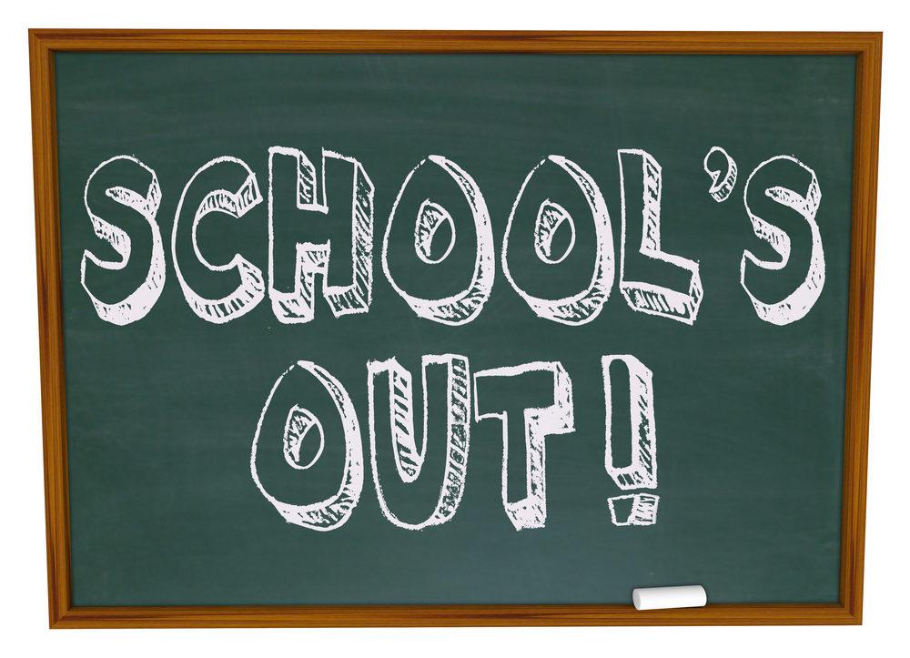 black chalkboard with the words school's out written in white chalk